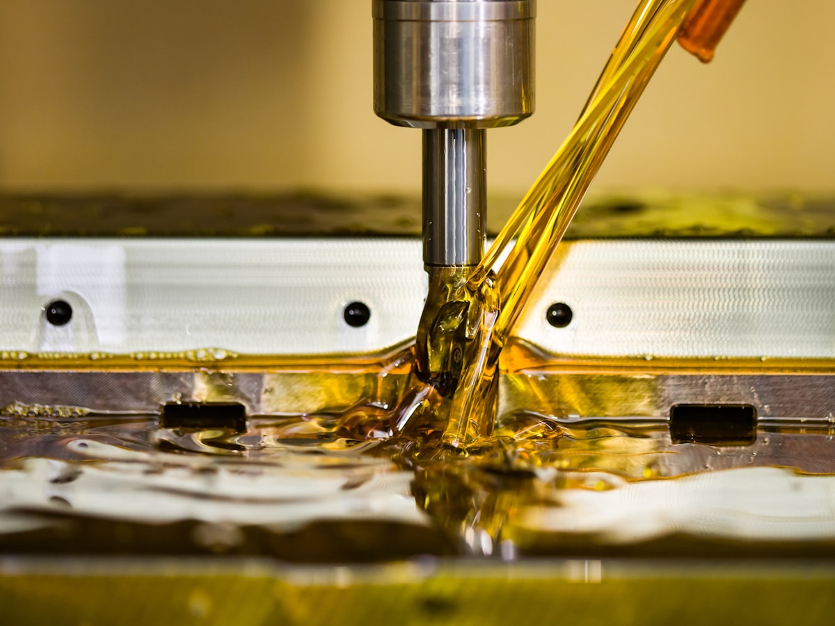 CNC mill cutting a metal component
